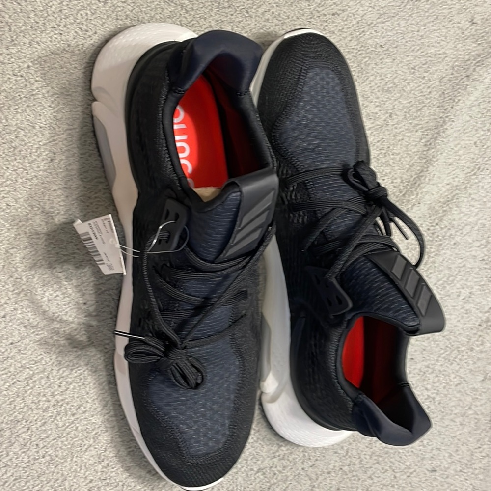 Adidas men’s Edge XT black sneakers.